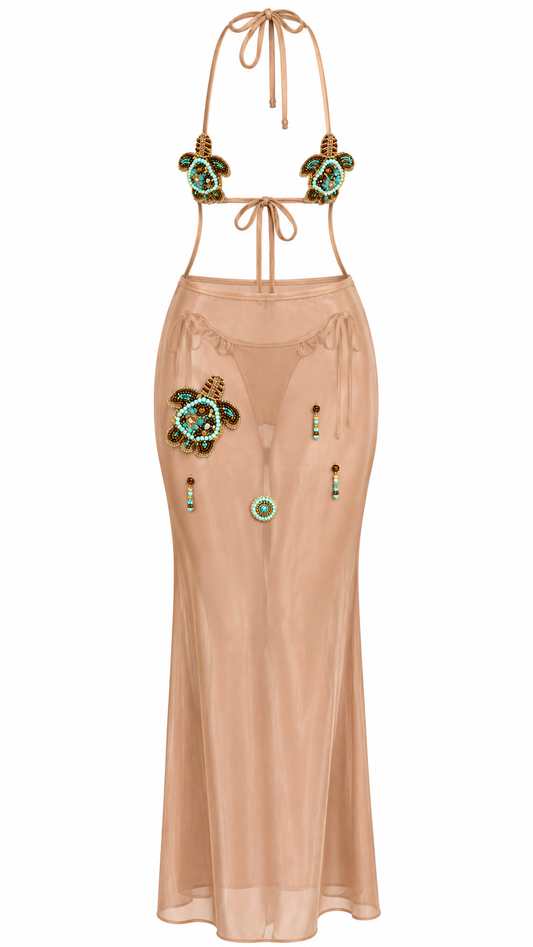 Turtle Premium studio cover with smaller embellished top and tie-side bottoms behind sheer skirt